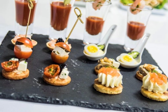 Canape selection with bloody Mary shots
